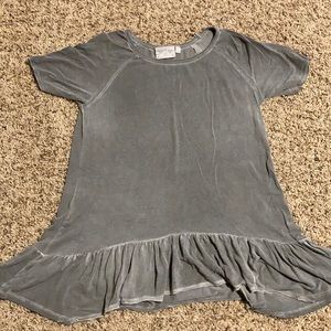 Distressed look peplum T size medium